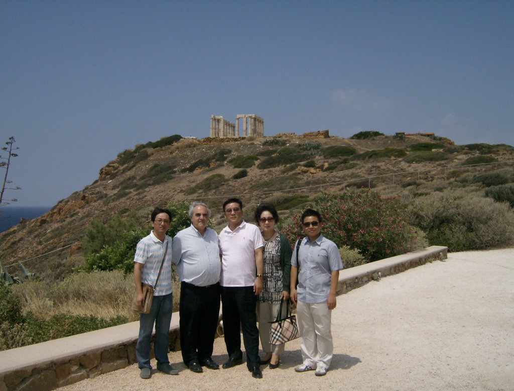 in front of ancient Greek temple of Poseidon in Sounion Attica Hellas